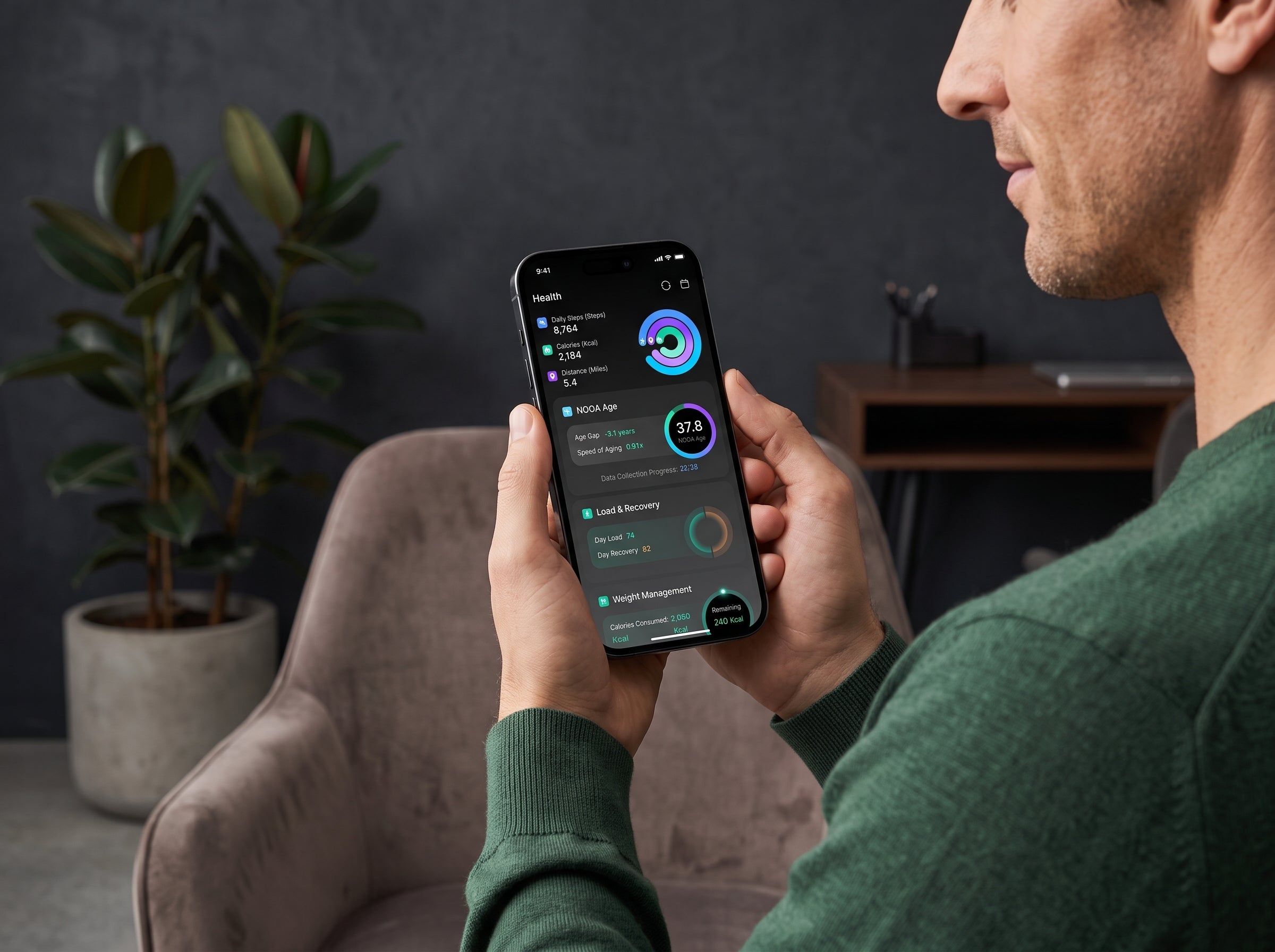 Man using NOOA body-composition scale with the NOOA app showing muscle, fat and weight trends
